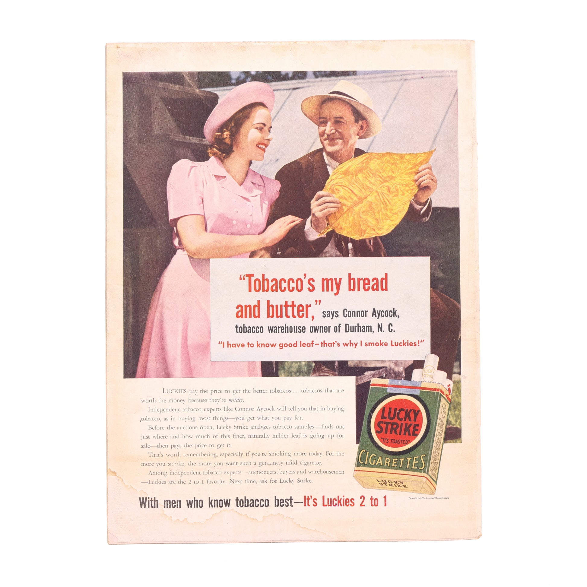 Vintage Lucky Strike cigarette advertisement with a couple holding bread, featuring text about tobacco.