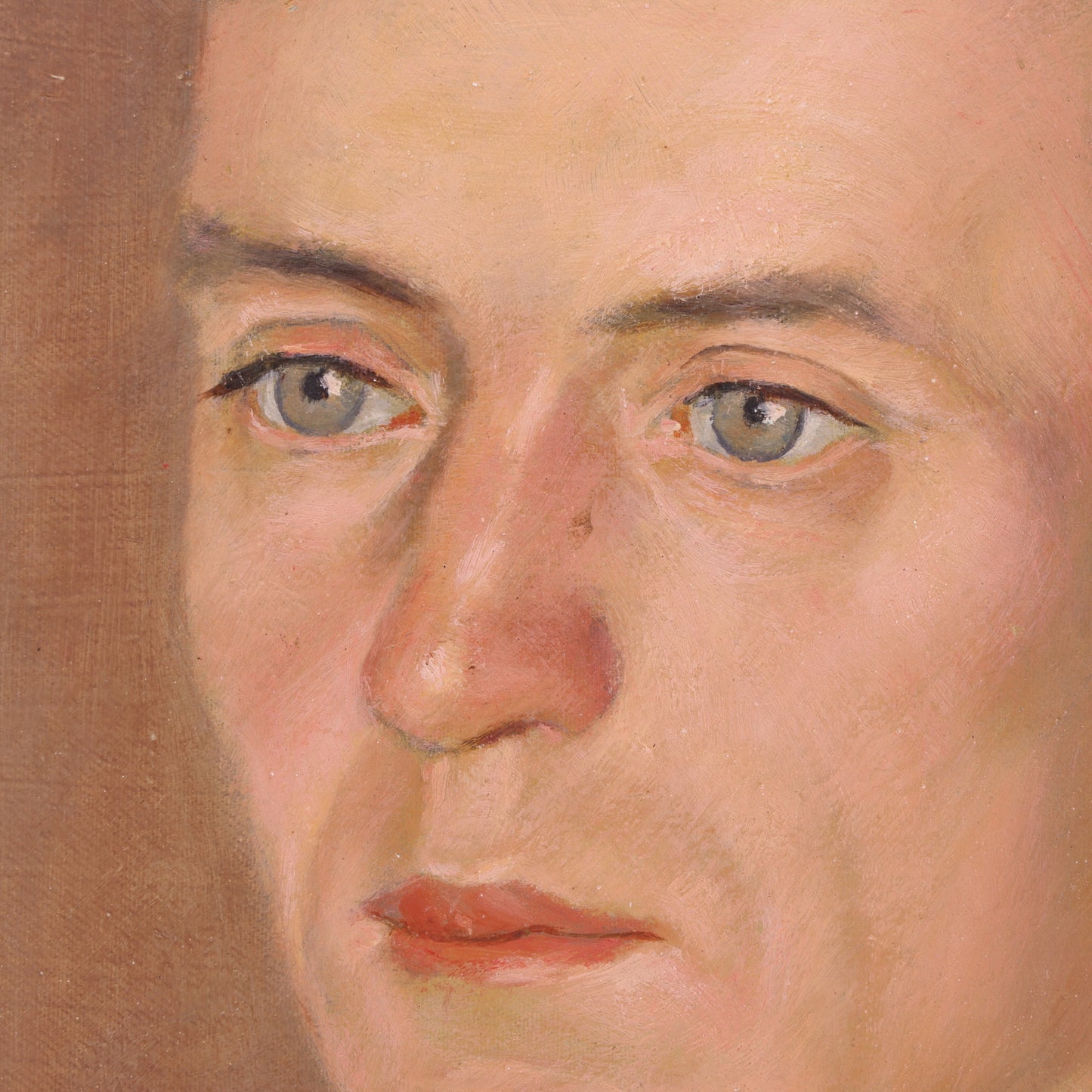 Close-up of a portrait painting with a focus on the face.