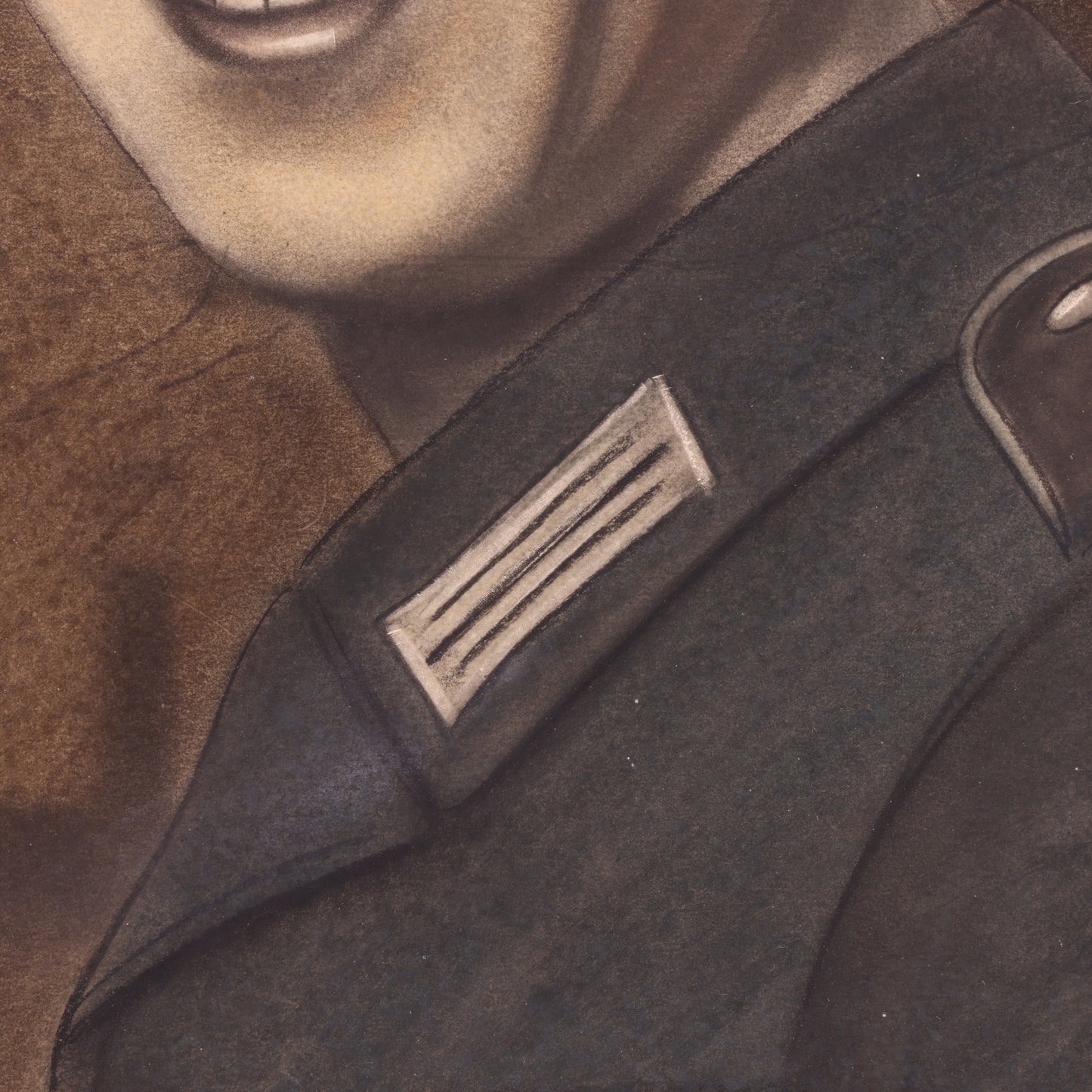 Close-up of a military uniform with a badge