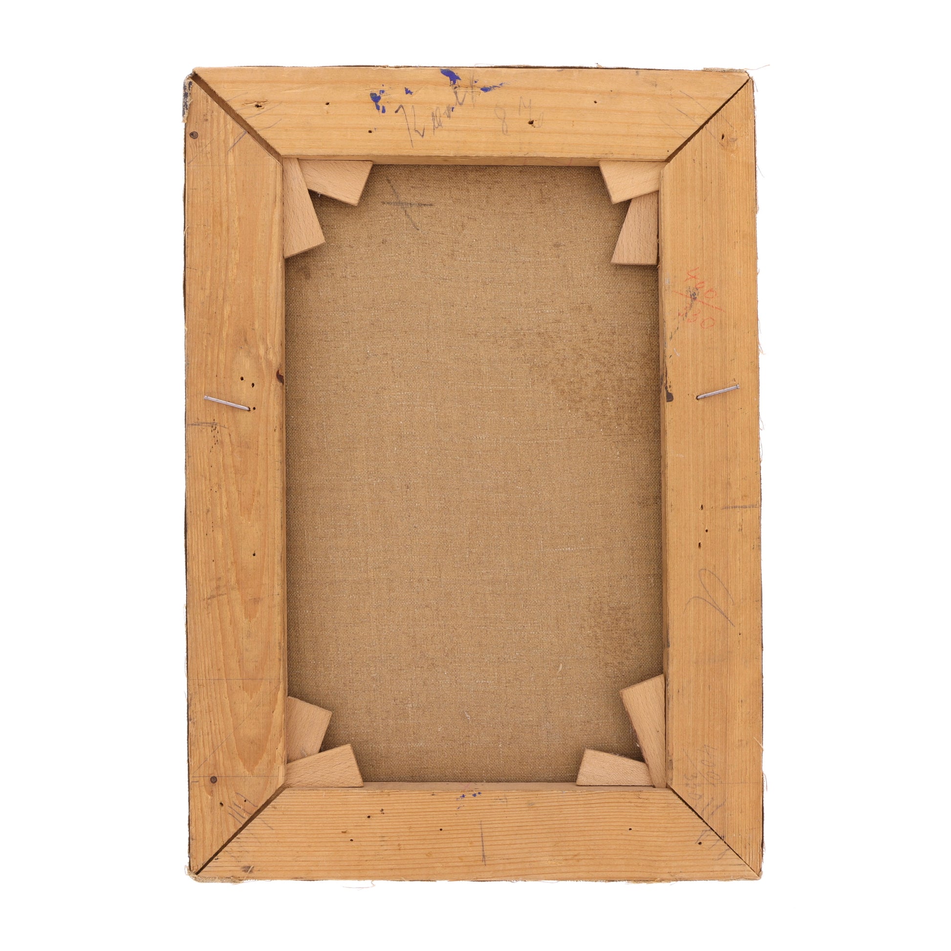 Back view of an oil painting's wooden frame on a white background