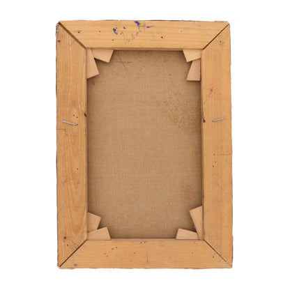 Back view of an oil painting's wooden frame on a white background