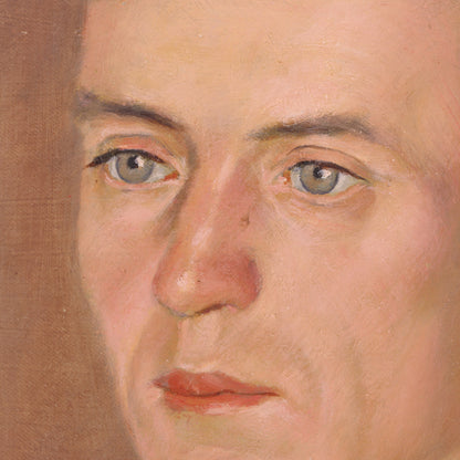 Close-up of a portrait painting with a focus on the face.