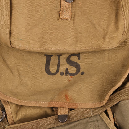 WWII U.S. Army M1928 Haversack by Baker-Lockwood Mfg. Co., Inc. with Pack Carrier & M1936 Pistol Belt Identified to George Petavine Jr. (1941)