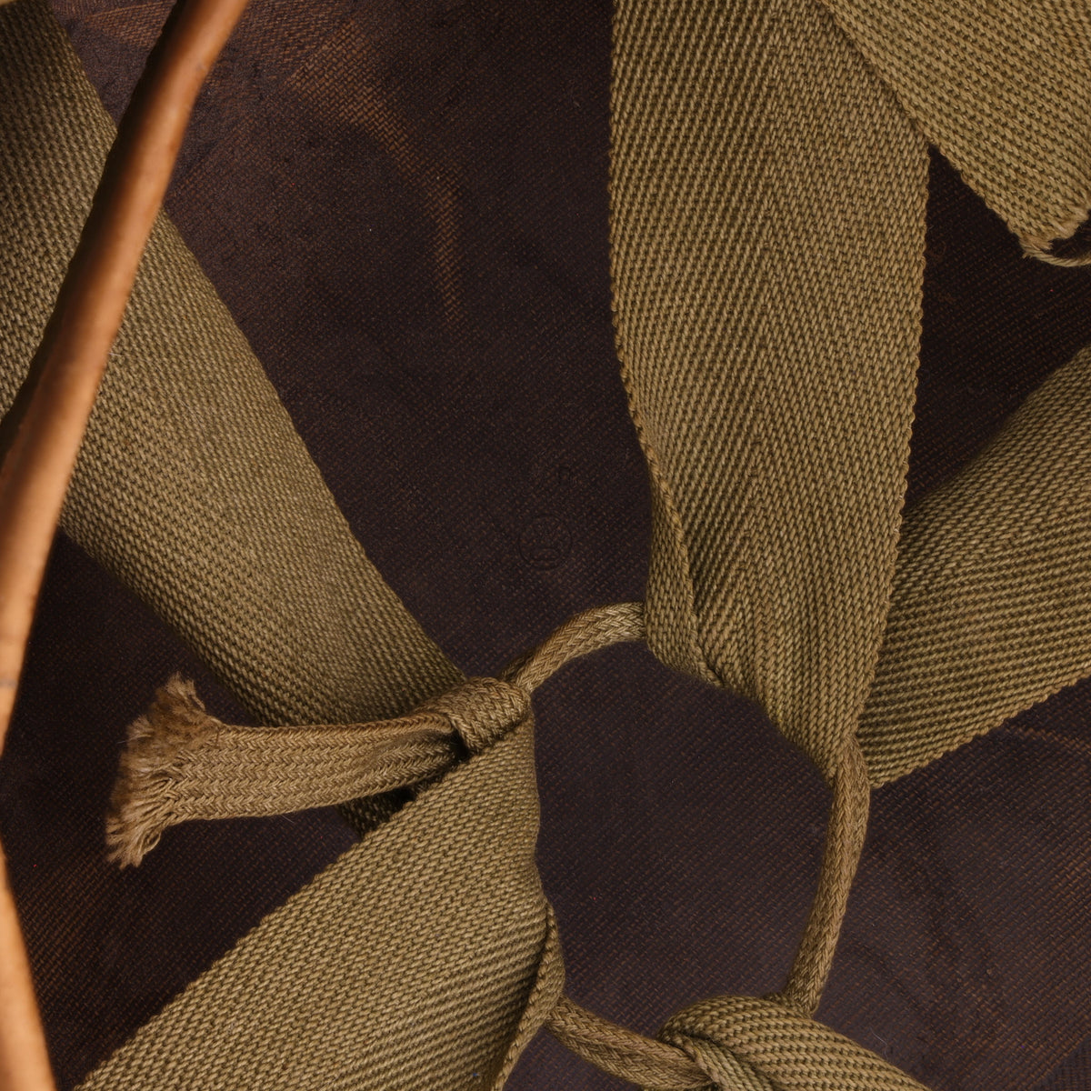 WWII U.S. Camouflage Painted Westinghouse M-1 Helmet Liner with Headband, Neckband & Leather Chinstrap (1944-45)